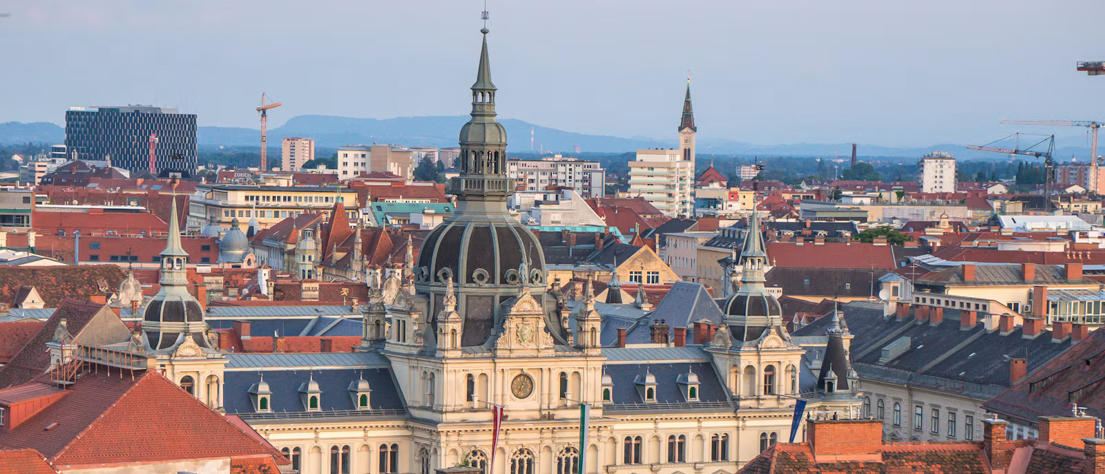 The Graz town hall dome and old-town roofs seen from Schlossberg hill