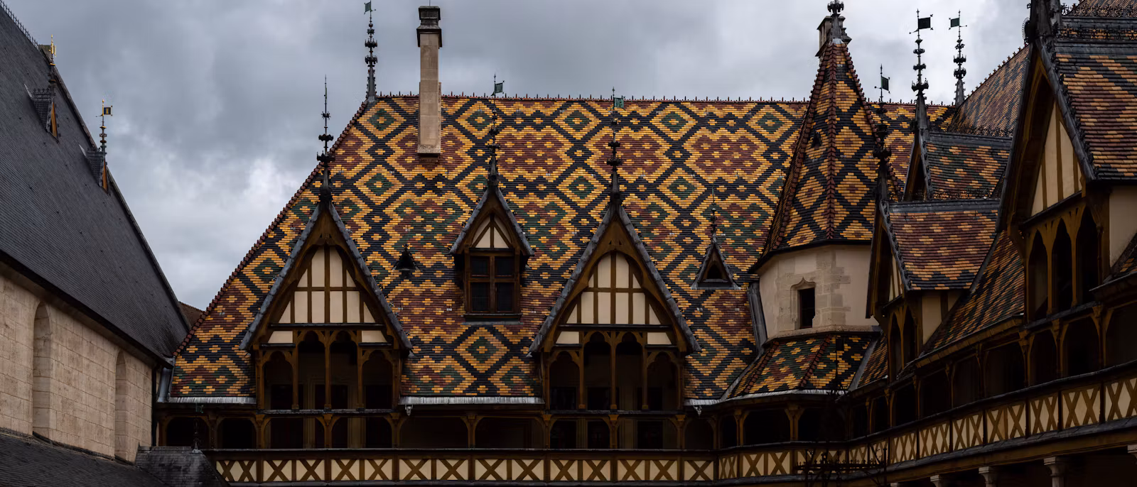 The glazed patterned roof of the Hospices de Beaune courtyard
